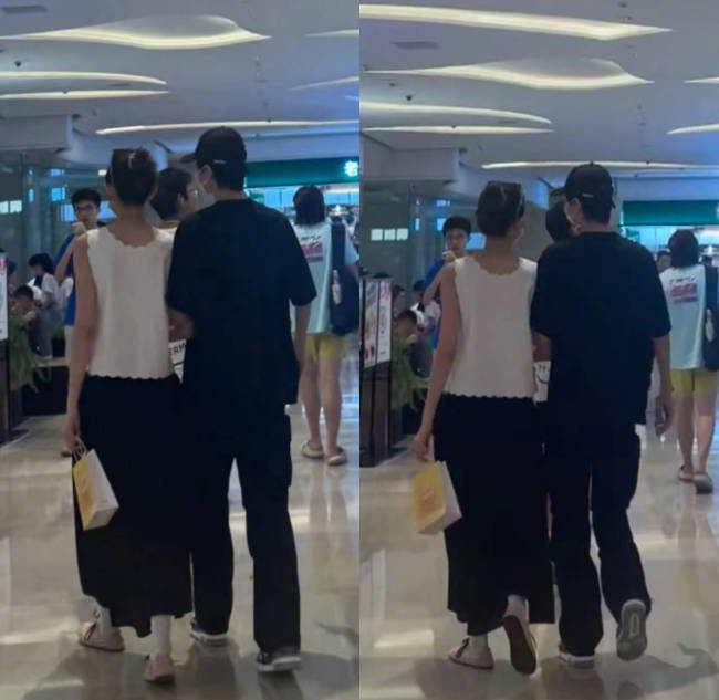 许嵩冯禧手牵手逛街被偶遇 两人穿搭低调姿势恩爱